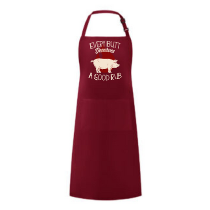 a red apron with a pig on it